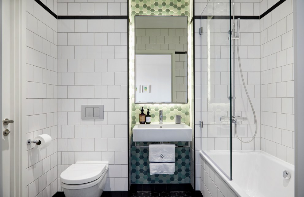 Sleek & Industrial Styled London City Island Apartment | Bathroom | Interior Designers